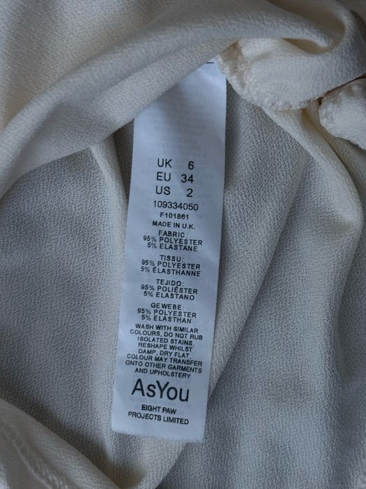 Блуза молочного кольору з декольте, розмір XS/S