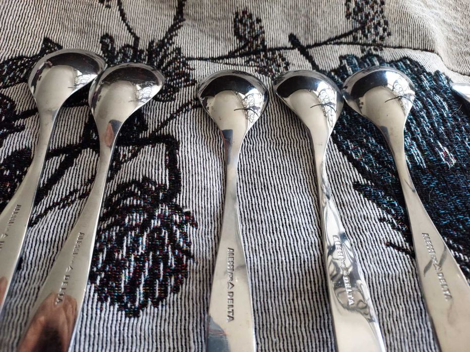 Zestaw  przyborów kuchnia- sitko, praska , kubek łyżki Alessi