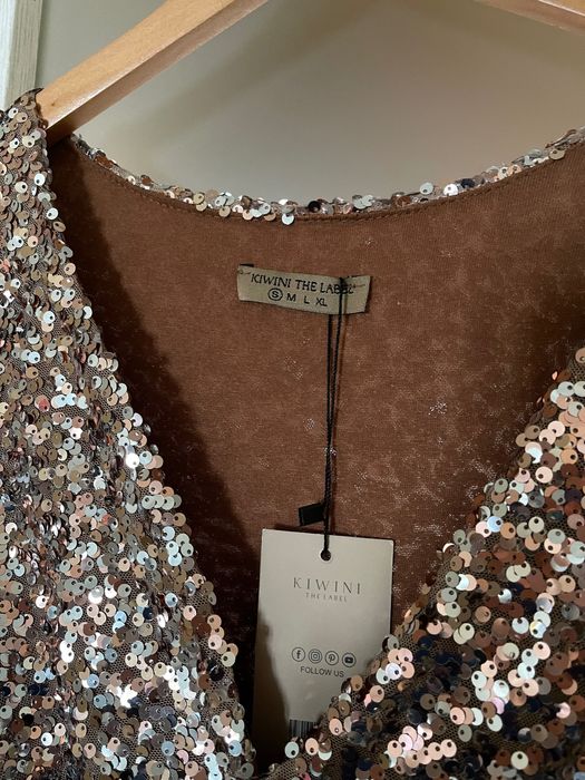 Vestido de lantejoulas dourado