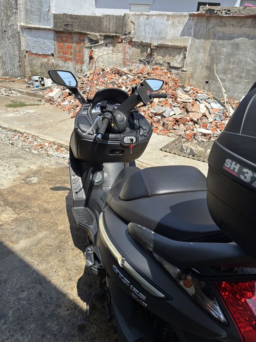 Sym gts 125 evo ( bom estado)