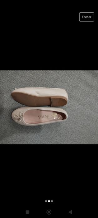 Sabrinas em pele beje como novas