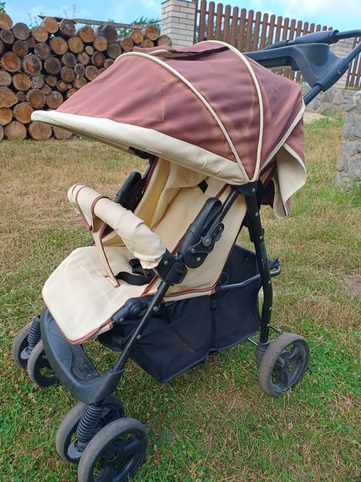 Дитяча прогулянкова коляска