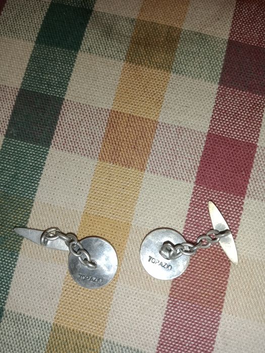 Botões de punho muninto antigos