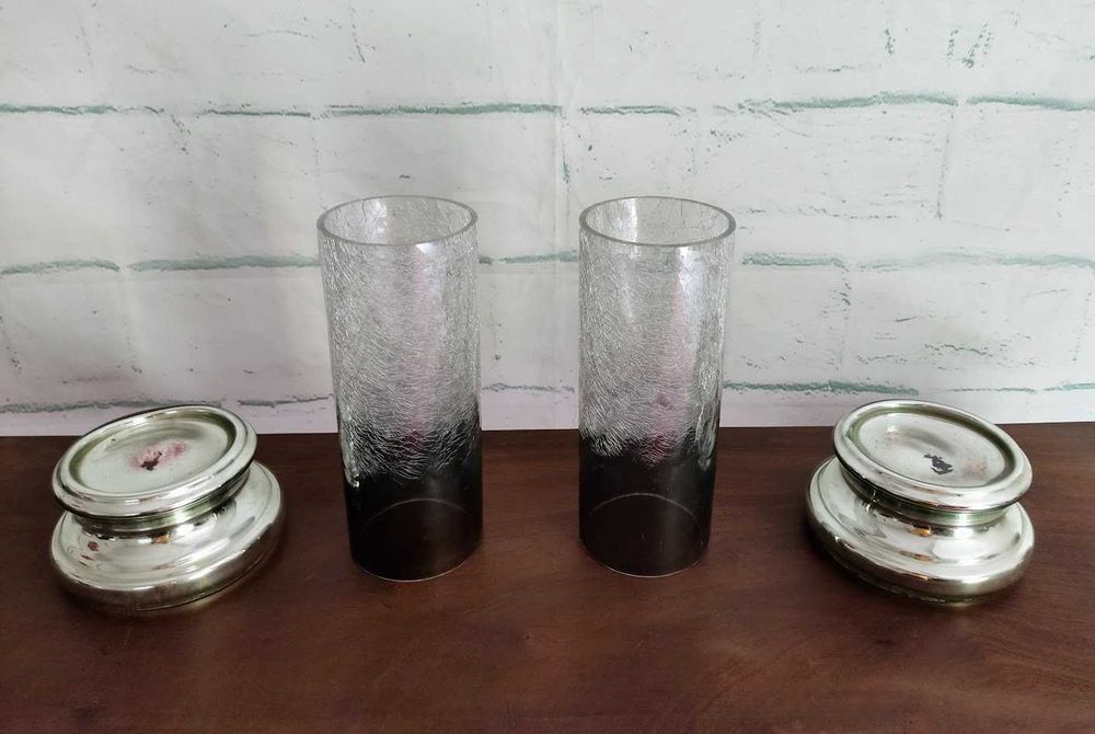 Par de porta velas em vidro e metal