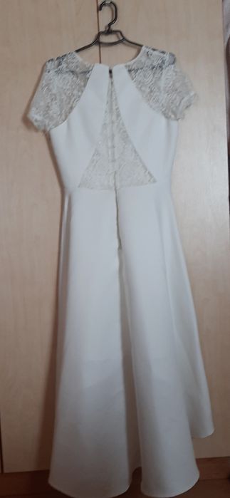 Вишукана святкова елегантна біла сукня  .
