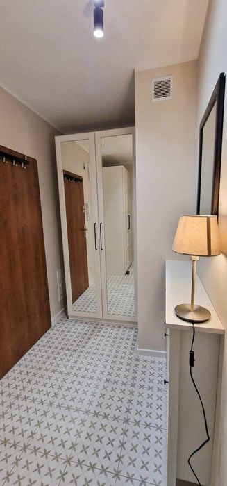 Kawalerka z balkonem i miejscem parkingowym w nowym bloku