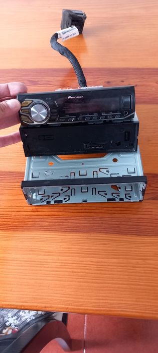 Auto radio Pioneer com gaveta fichas e aro preto