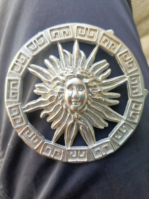 Срібна пряжка з сонцем — унікальний аксесуар [антикварна]