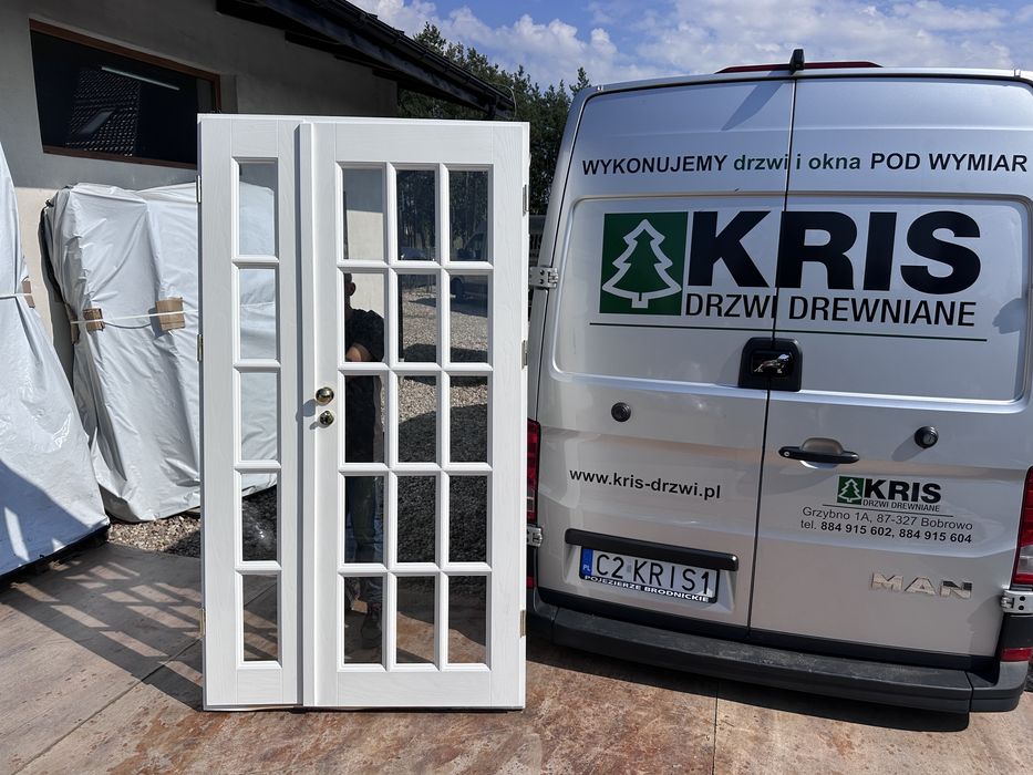 Drzwi wewnętrzne drewniane dwuskrzydłowe białe szpros Montaż c Polska