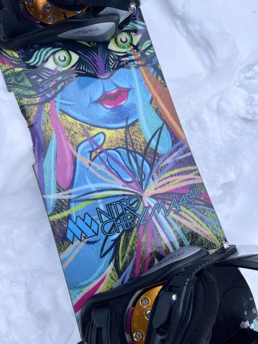 Deska snowboardowa Nitro 146 cm plus wiazania Atomic
