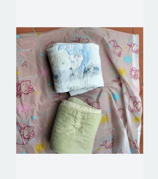 Edredão de solteiro e cama de bebe