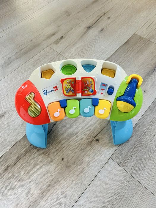 Zabawka interaktywna grajek 38x23 cm