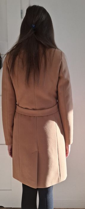 Elegancki modny płaszczyk damski