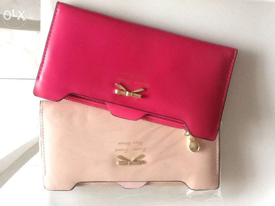 Porta Moedas de Senhora Rosa, Novo