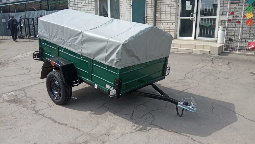 НОВИЙ УНІВЕРСАЛЬНИЙ ПРИЦЕП с завода 2000/1300/410  Доставка. Гарантія.