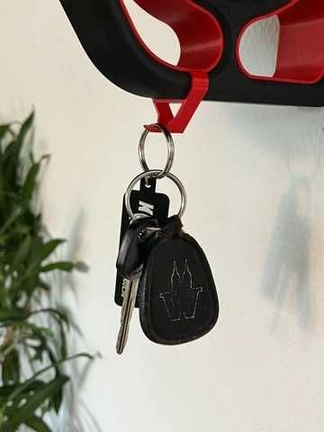Suporte para capacete de moto e casaco