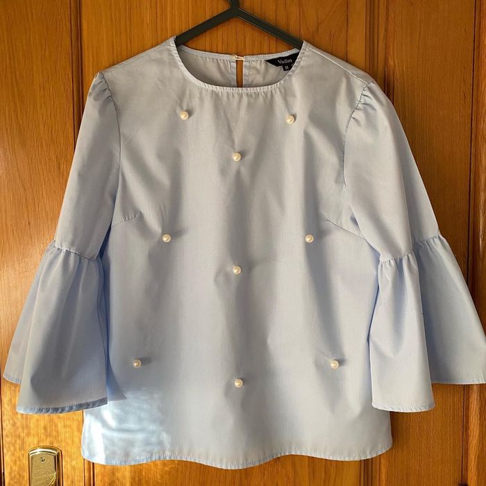 Blusa com pérolas