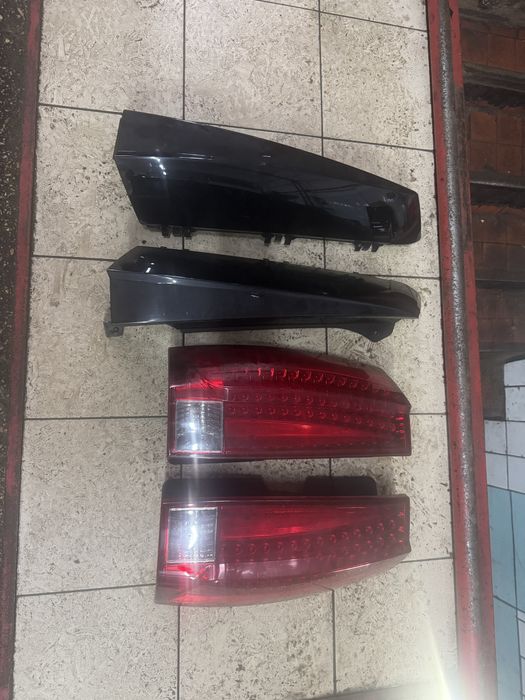 Cadillac escalade 2007+ ліхтарі задні + накладки кузову