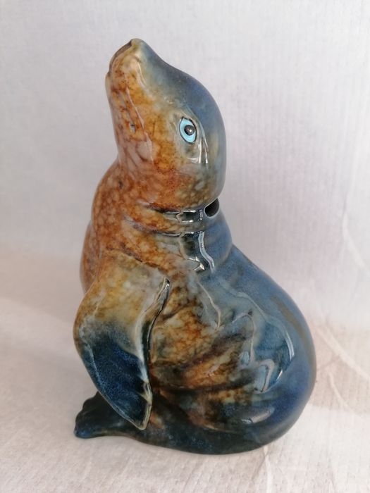 Śliczna ceramiczna skarbonka figurka foka