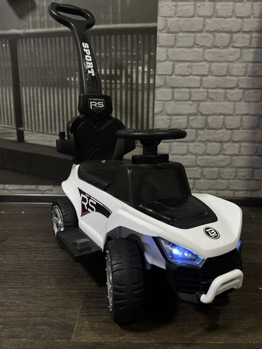 Каталка Bambi Racer 2в1 с музыкой и светом Белый