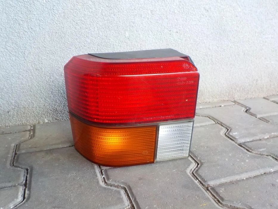 VW T4 MULTIVAN LAMPA TYŁ TYLNA ORYGINAŁ VW ŁADNA LEWA
