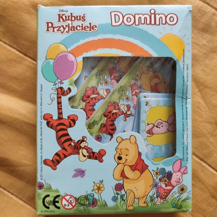 Domino Kubuś i przyjaciele oraz książka Puchatek hoduje dynię Egmont