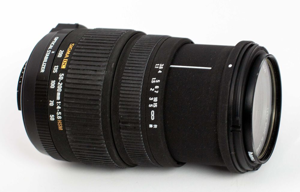 Objetiva Sigma 50-200mm,establizada, para Nikon