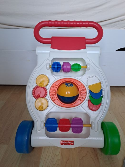 Pchacz do nauki chodzenia. Marka Fisher Price.