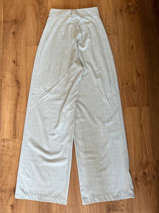 Брюки у смужку сірі