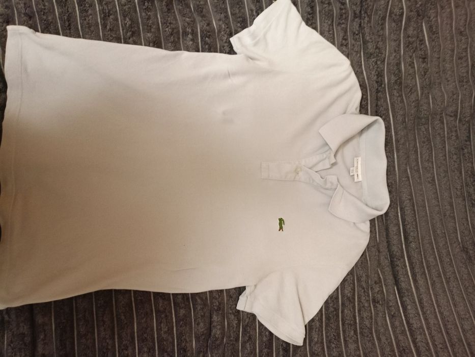 Поло від lacost.