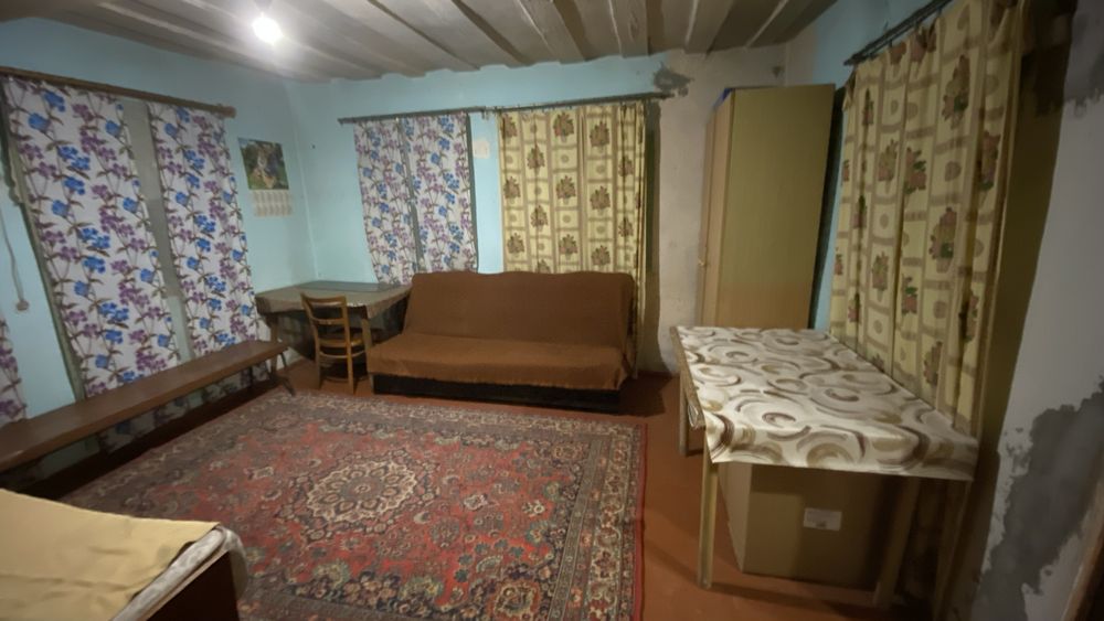 Продаж землі з будинком