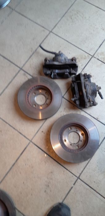 Zaciski kompletne +tarcze hamulcowe+ klocki  ,