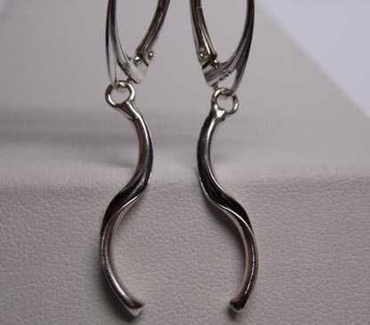 Srebrne wiszące kolczyki wywijane rurki wewnątrz oksydowane