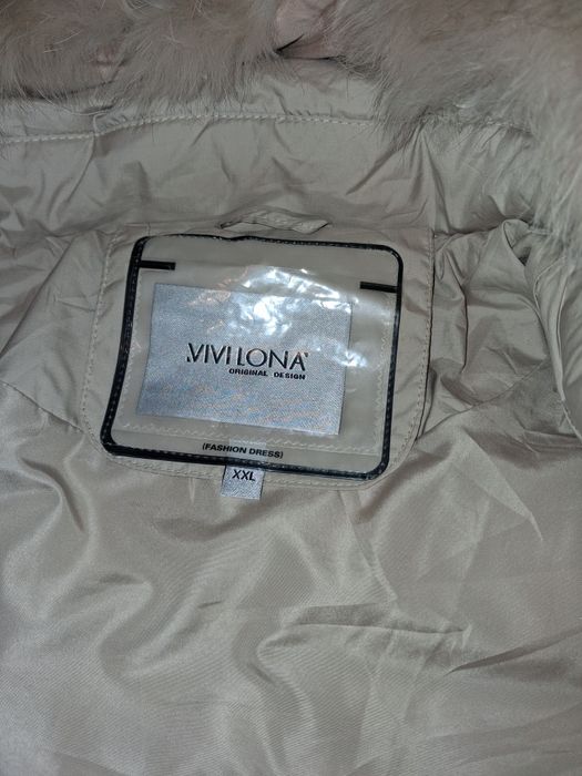 Жiночий пуховик, натуральне хутро.