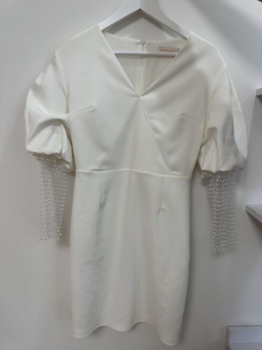 Біла сукня вечірня