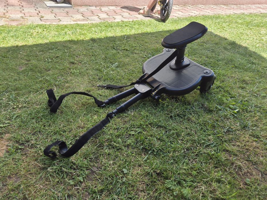 Dostawka do wózka z siedziskiem