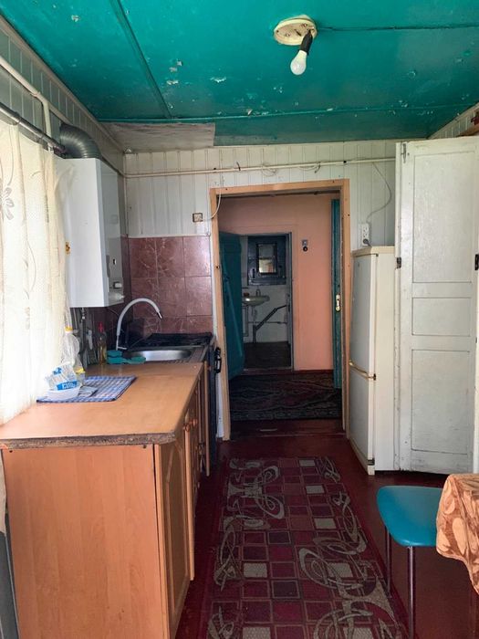 Продаю   пів будинку,  потребує ремонту  (район Вокзал)