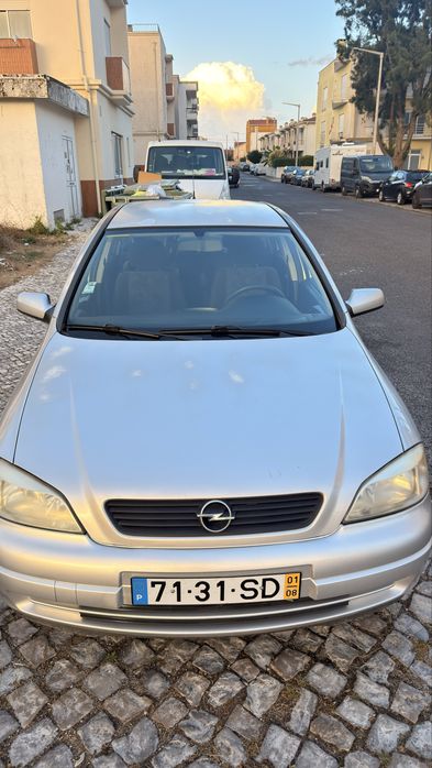 Opel 4 portas 165 mil km motor impecavel 2mil foto 2