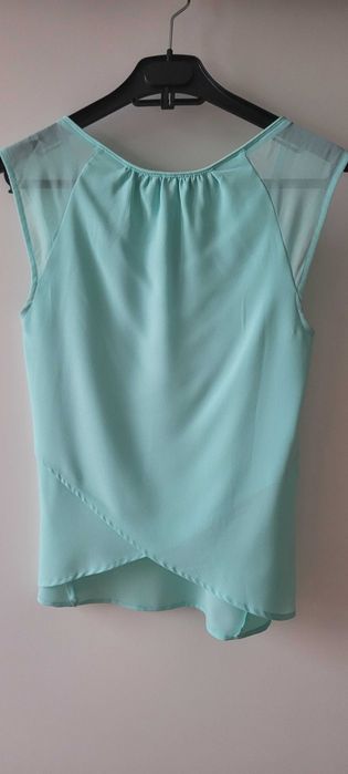 Blusa completamente nova