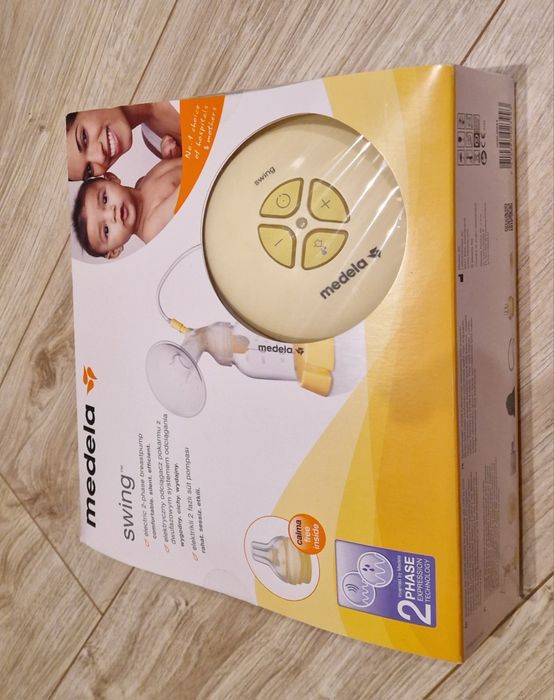 Laktator medela swing + calma + 4 woreczki do sterylizacji w mikrofal