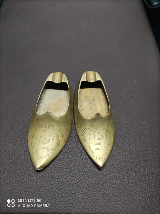 Sapatinhos de latão cinzeiro