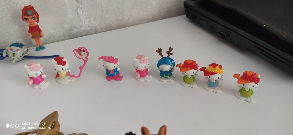 Іграшки Кіндер сюрприз, принцеси, хеллоу Кітті,  Маша та ведмідь,