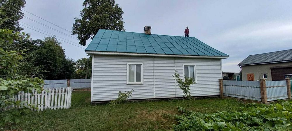 Миття та фарбування дахів фасадів ангарів. Мийка даху