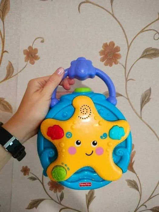 Projektor Fisher Price ośmiornica melodyjki kołysanki