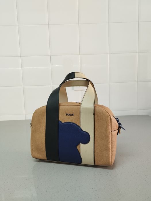 Malote da tous original em pele como nova.