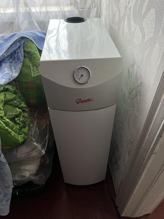 Котел газовый отопительный стальной Данко 10 с