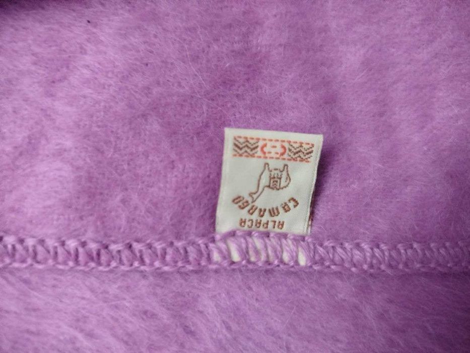 Теплий, м'який та натуральний шарф для холодних зимових днів.