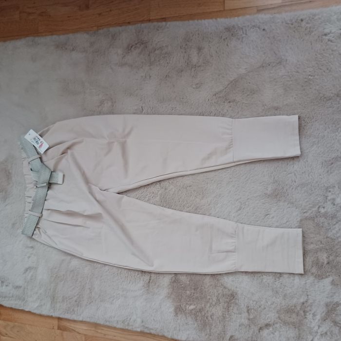 Spodnie roz uni kolor jasny beż