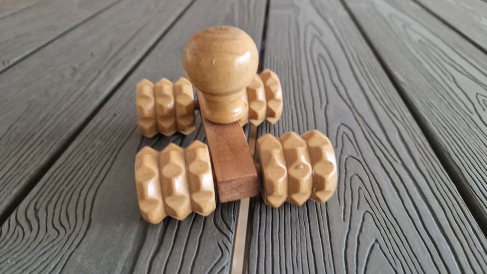 Rolo de massagens de madeira