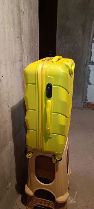 Великий дорожній чемодан тканинний з поліестеру на 4-х колесах